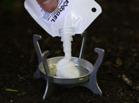 Exogel Camping Stove Gel Fuel being dispensed from the pouch into a Phantom lightweight stove.
