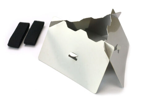 The Stealth Stove and its two hook and loop pack straps, laid out on a plain white background.