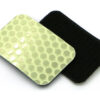 Two Cyflect Patches, showing the glow-in-the-dark / retroreflective surface, and the hook patch surface, on a plain white background.