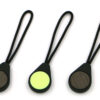 Three Magnetags, showing both the neodymium magnet surface, and the rear glow-in-the-dark marker, on a plain white background.