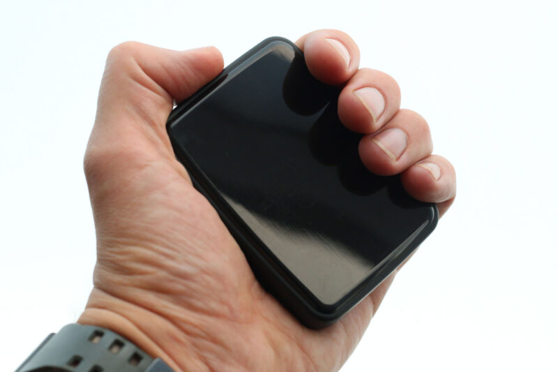 The palm-sized Magnetic Pocket Case held in a hand.