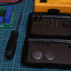 The Magnetic Pocket Case being used for storing batteries, electrical and electronic components and other parts for a hobby project.