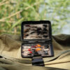 The Magnetic Pocket Case being used for storing fish hooks and trout fly lures while out fishing.