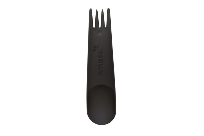 The durable polypropylene spork on a plain white background.