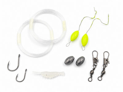 The Mini Survival Fishing Kit's contents laid out neatly on a plain white background.